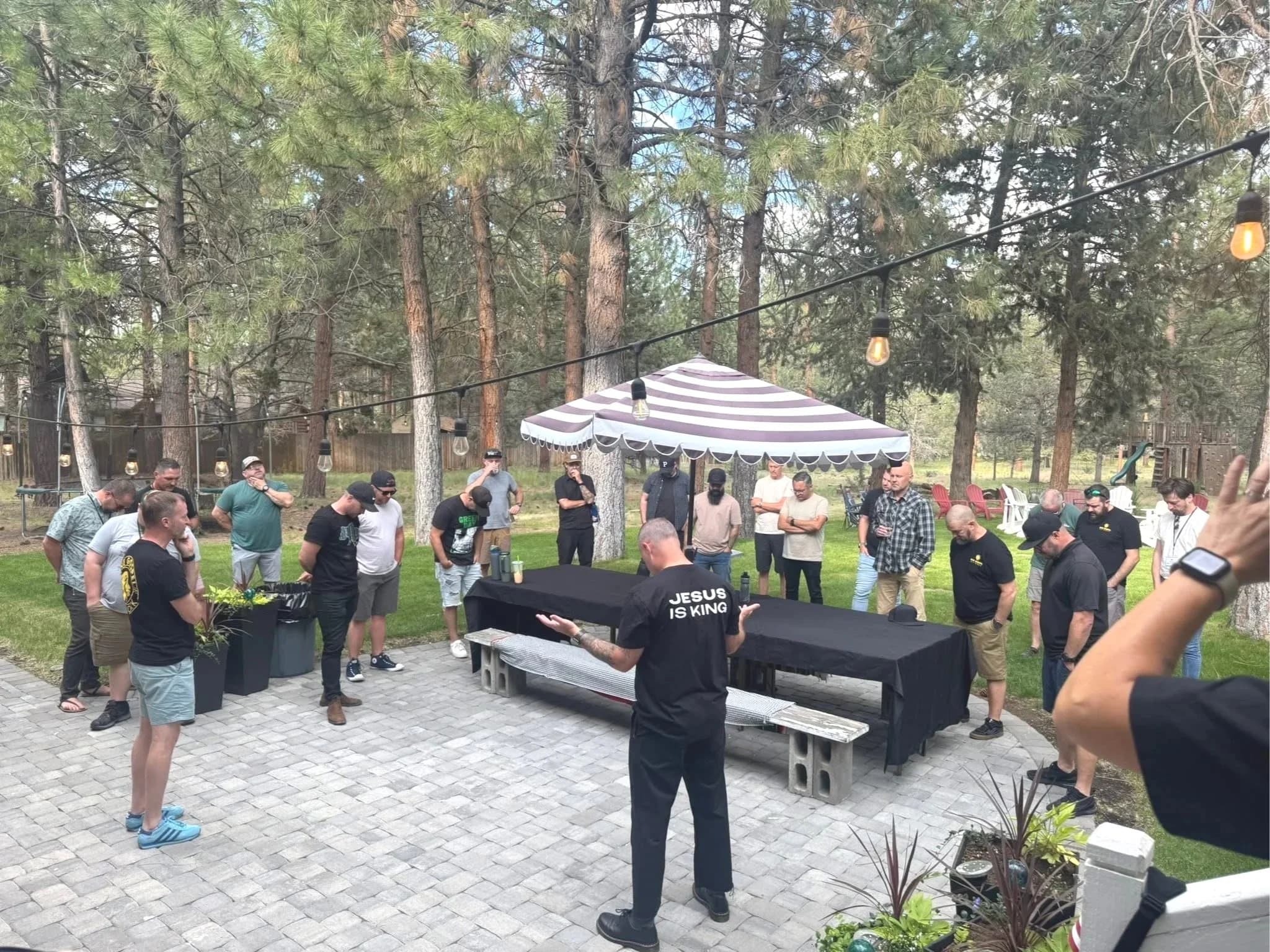 Pastors praying together at a One Gospel gathering